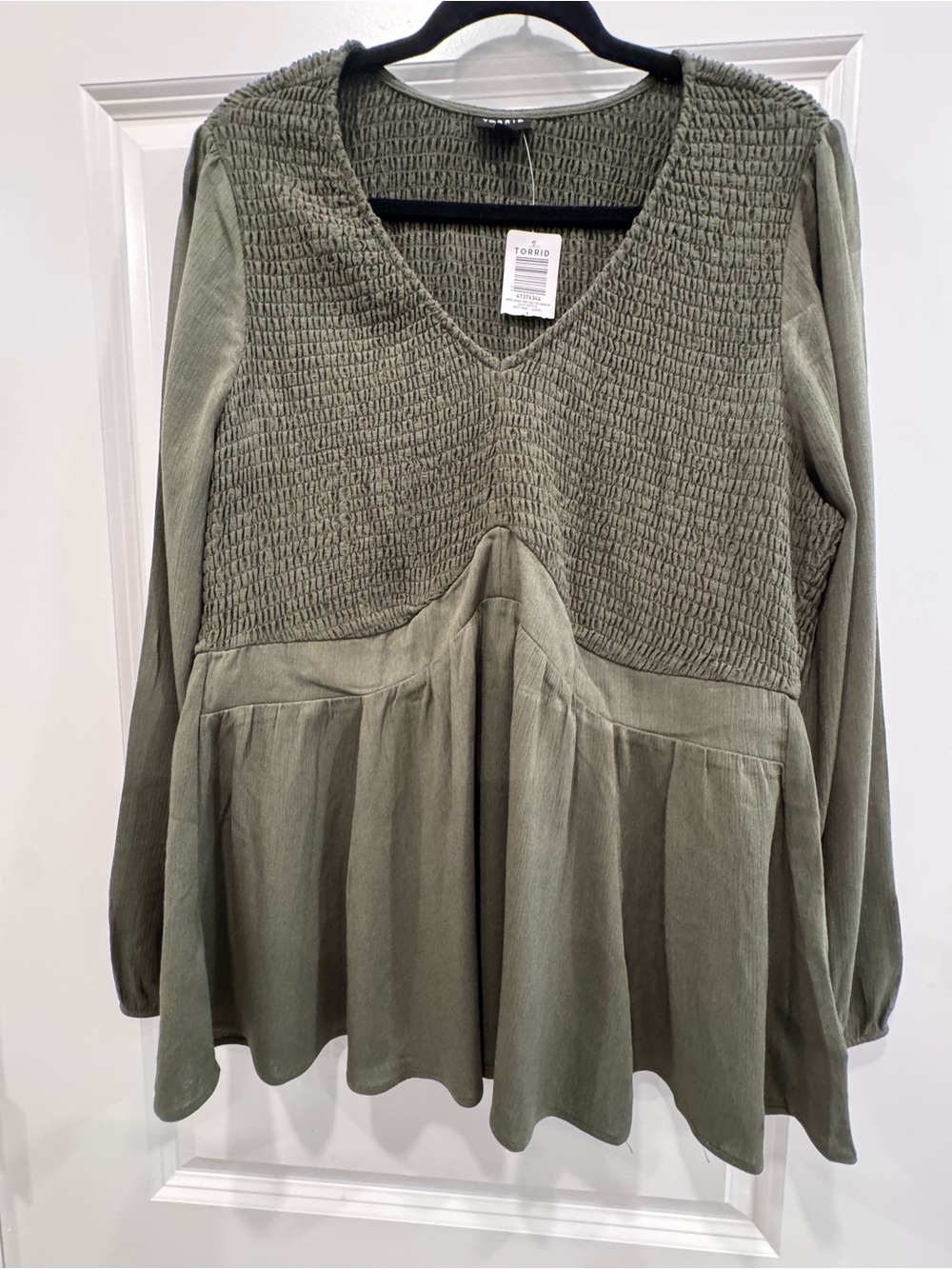Torrid olive smocked V‑neck peplum blouse